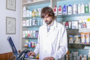 pharmacist working with the computer