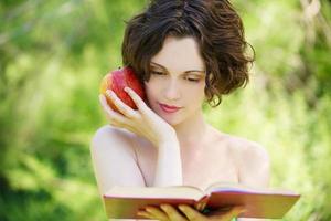 girl with book outdoors