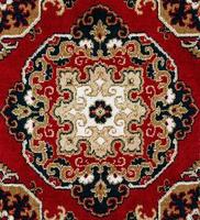 Fondo de alfombra persa oriental rojo