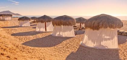 Tiki Huts and Massage Tents on Beach