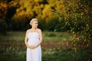 Young  caucasian pregnant woman photo