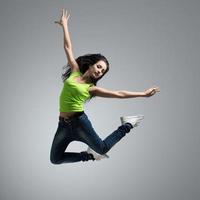 beautiful caucasian woman dancer jumping photo