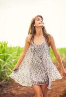 Gorgeous girl walking in the field, Summer Lifestyle photo