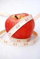 Apple with an old measuring tape