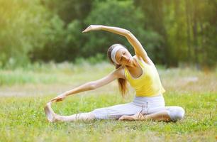 Sport, fitness, yoga - concept, woman doing exercise