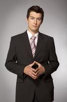 Young caucasian confident businessman photo