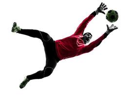 caucasian soccer player goalkeeper man catching ball silhouette photo