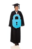 young african american graduate holding lock symbol
