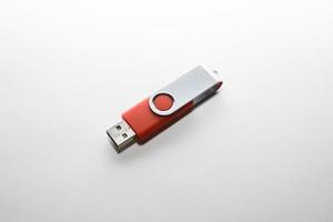USB flash storage on white photo