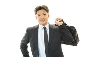Smiling Asian businessman photo