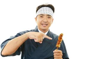 Smiling Asian chef photo