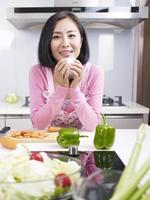 smiling asian housewife photo