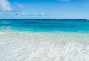 Ocean and tropical sandy beach background photo