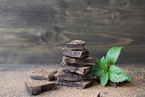 Dark chocolate with mint sprinkled with cocoa powder photo