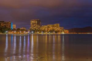 Waikiki beach at night photo