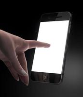 Woman hand touching smart phone blank isplay photo