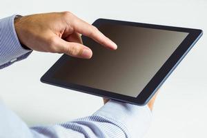 Man using a tablet pc photo