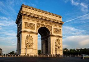 Arch of Triumph (Arc de Triomphe) with dramatic sky photo