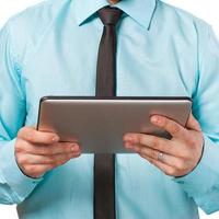 man holding digital tablet, closeup photo