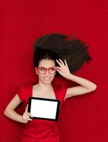 Happy Woman Wearing Glasses Holding Tablet