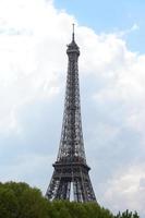 Eiffel Tower against the clouds photo