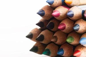 Colorful wooden pencils on white background