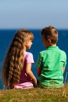 Boy and girl during summer time photo