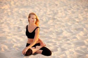 Meditation yoga on a beach photo