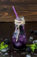 Refreshing blackberry juice in vintage eco style bottle