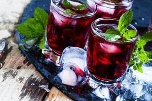 Pomegranate drink with mint and ice
