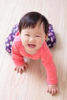crawling baby girl smile