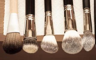 Process of cleaning drying makeup brushes photo