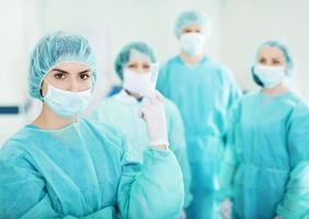 Surgical team in scrubs before starting surgery