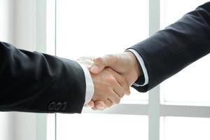 Handshake of businessmen -  greeting,dealing & partnership concepts photo
