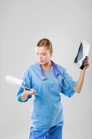 healthcare and medical concept - female doctor with stethoscope photo