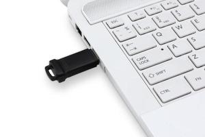 USB Flash drive connecting to laptop photo