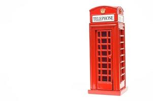 Red phone booth isolated on white background