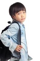 Boy with school bag photo