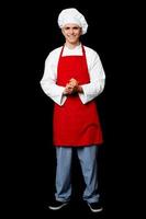 Full length portrait of a handsome chef photo