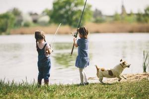 Two little girls fishing photo