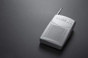Radio receiver gray isolated on a dark background photo