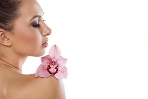 Woman and orchid photo