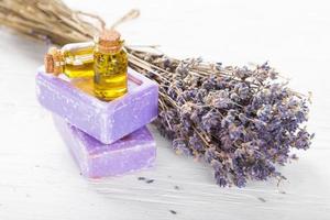 Lavender flowers with essential oil. Spa and wellness concept. photo
