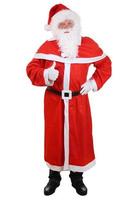 Santa Claus full length portrait showing thumbs up on Christmas photo
