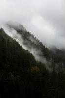 Storm clouds in mountain ravines photo