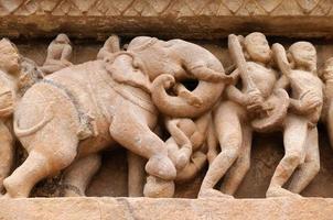 Indian religious symbols on temples in Khajuraho photo
