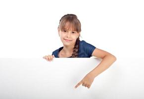 Cute caucasian girl with blank board photo
