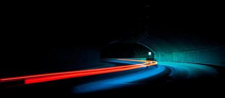 Car light trails in the tunnel photo