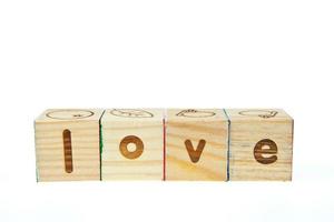 Love by block toy isolated on white background