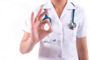 doctor showing okay gesture, isolated over white background